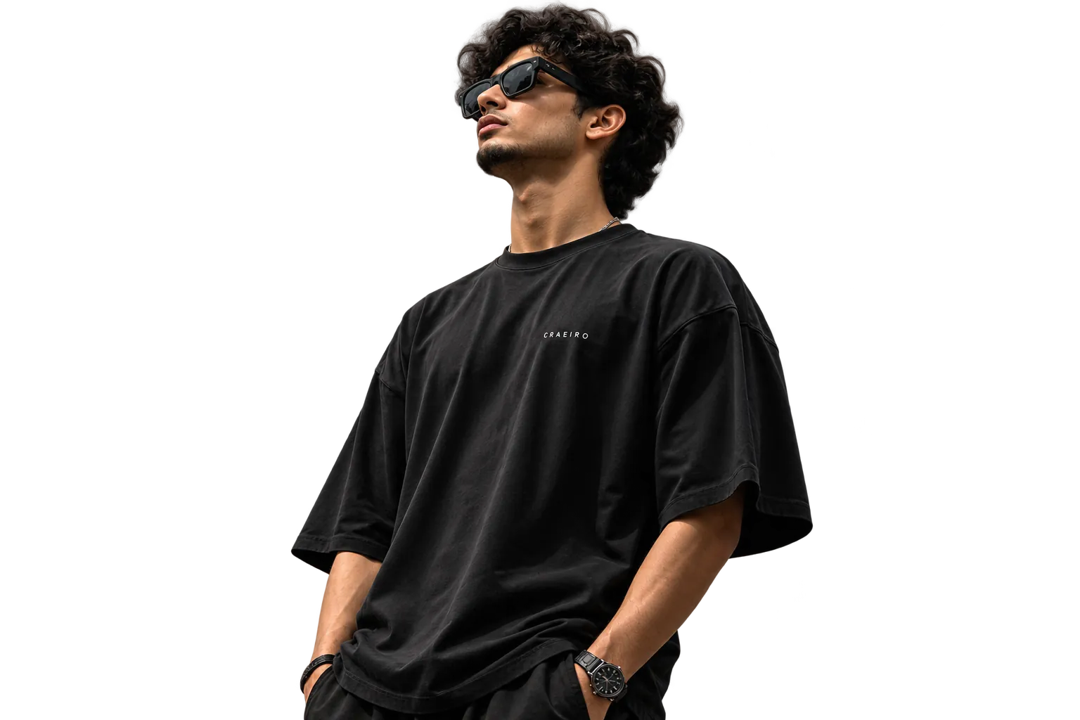 Model wearing an oversized black RAWFLEX tee